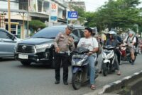1763444070990-ilustrasi-razia-terhadap-pengendara-anak-di-bawah-umur-tak-menggunakan-helm-1763424820943_169