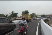 1764090349947-akses-jalan-layang-di-gandus-sudah-bisa-dilalui-kendaraan-1764066175080_169
