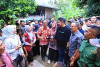 1764997548537-gubernur-sumsel-herman-deru-saat-dialog-bersama-warga-1764948263145_169