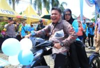 1765127129555-bantuan-motor-roda-tiga-yang-diserahkan-untuk-difabel-1765099093051_169