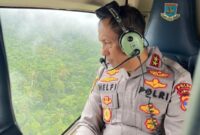 1765127132641-kapolda-lampung-irjen-helfi-assegaf-saat-memantau-aktivitas-pembalakan-di-hutan-pesisir-barat-1765097957108_169