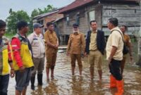 1765364747918-banjir-terjadi-di-wilayah-muara-padang-banyuasin-akibat-hujan-dan-air-sungai-pasang-1765343056623_169