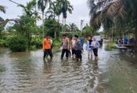 1765537553842-kondisi-banjir-di-muba-imbas-curah-hujan-tinggi-1765527270709_169