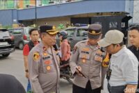 1767719139747-polisi-mendatangi-tkp-terjadinya-aksi-saling-serang-menggunakan-sajam-di-palembang-1767696964843_169