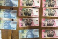 1768388769252-penampakan-uang-palsu-yang-hendak-diedarkan-pemuda-pengangguran-di-lampung-selatan-1768367273000_169