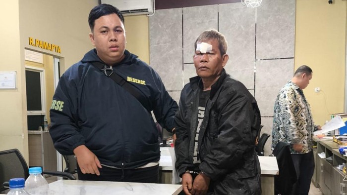 1768388774287-pelaku-persetubuhan-terhadap-anak-tiri-di-palembang-saat-diamankan-polisi-1768371537689_169