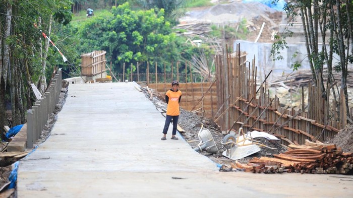 1769231153895-akses-jalan-penghubung-oku-selatan-oku-timur-kini-50-km-1769178824503_169